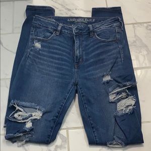 Distressed High Rise Jegging